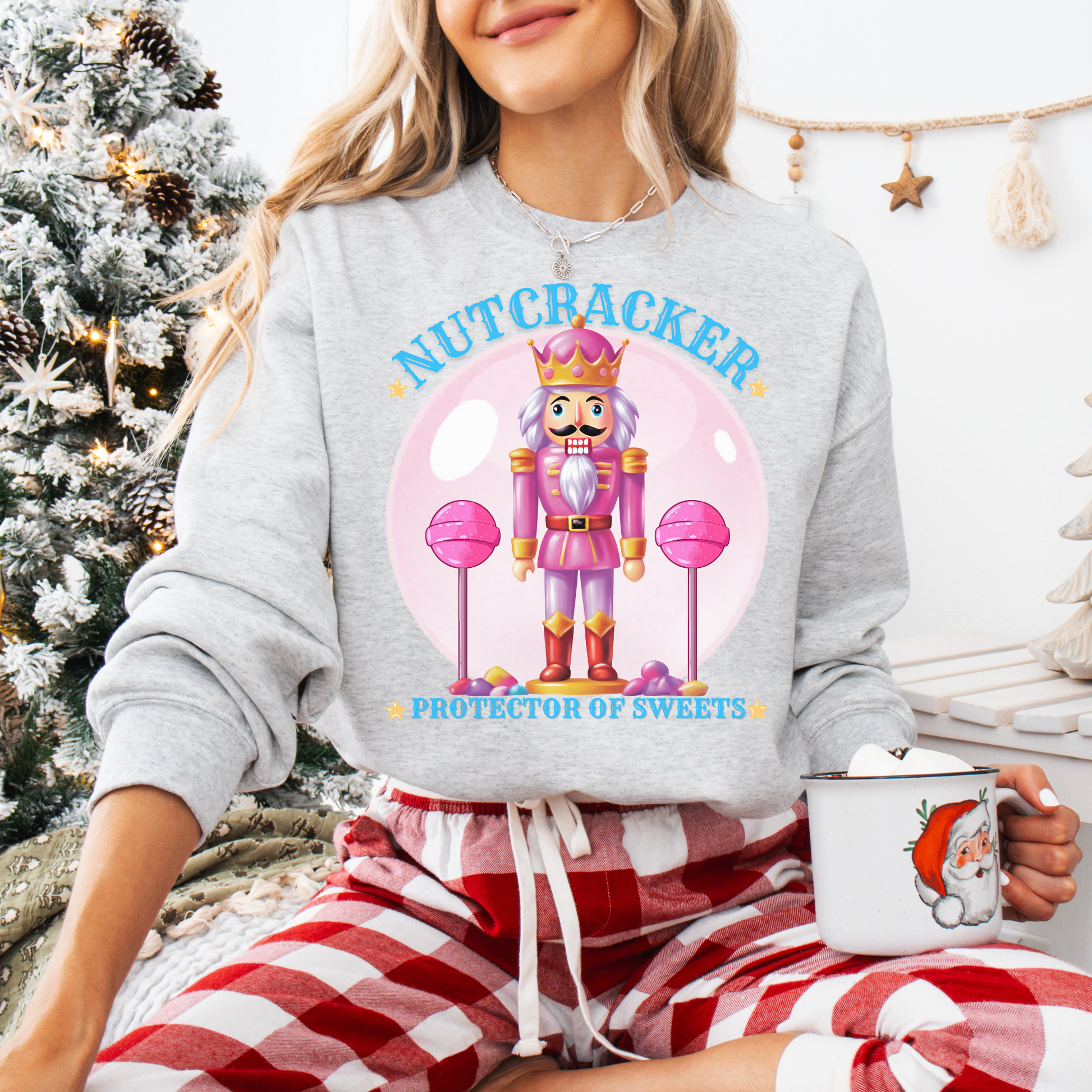 Christmas Nutcracker Sweater Protector of Sweets Pullover  
Holiday Nutcracker Design  
Cute Candy Themed Sweatshirt
Pink Nutcracker Cotton Sweater  
Festive Holiday Pullover  
Nutcracker Ballet Inspired Apparel  
Whimsical Christmas Sweatshirt  
USA Made Holiday Sweater  
Cozy Cotton Christmas Pullover  
Sweets Guardian Nutcracker Shirt  
Modern Nutcracker Graphic Tee  
Candy Land Holiday Wear  
Regal Nutcracker King Sweater  
Enchanted sweet candy Sweater hotsweettees free shipping