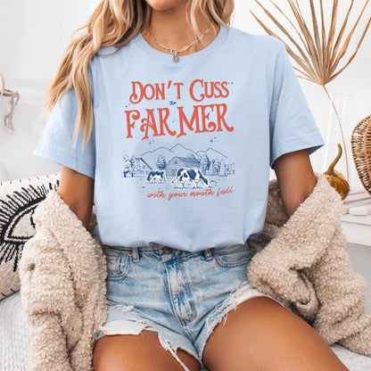 Dont cuss the farmer with your mouth full hot sweet tees farm cow buy local southern theme birthday gift womens gift farming peach mockup free shipping hot sweet tees country themed patriotic farmer farmer lovers farming southern pride cattle farmer cows farm ranch beef is what’s for dinner Baby blue t shirt unisex farmer cattle farmer beef overs cow lovers free shipping 