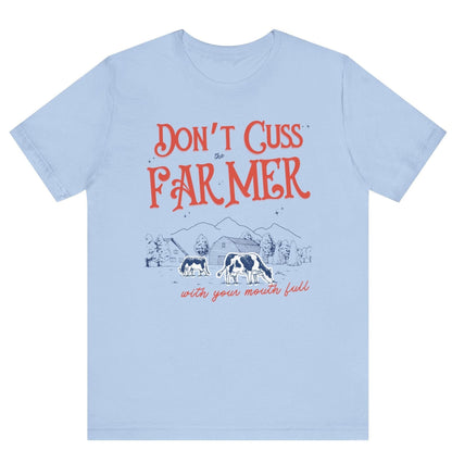 Dont cuss the farmer with your mouth full hot sweet tees farm cow buy local southern theme birthday gift womens gift farming peach mockup free shipping hot sweet tees country themed patriotic farmer farmer lovers farming southern pride cattle farmer cows farm ranch beef is what’s for dinner Baby blue t shirt birthday gift hot sweet tees cow farmer beef farmer 