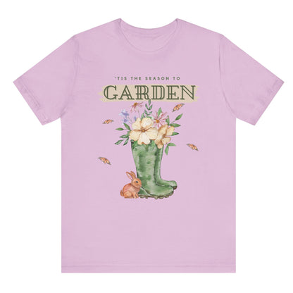Tis the season to garden hotsweettees spring time gardening gardener gift free shipping unisex soft spring t shirt spring bunny rain boots butterflies watercolor flowers Gift garden spring time pastels Easter bunny Lilac brown bunny
