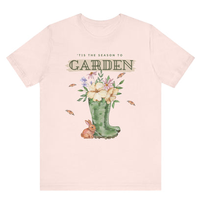 Tis the season to garden hotsweettees spring time gardening gardener gift free shipping unisex soft spring t shirt spring bunny rain boots butterflies watercolor flowers Gift garden spring time pastels Easter bunny Pink tee brown bunny
