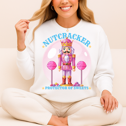 Christmas Nutcracker Sweater Protector of Sweets Pullover  
Holiday Nutcracker Design  
Cute Candy Themed Sweatshirt
Pink Nutcracker Cotton Sweater  
Festive Holiday Pullover  
Nutcracker Ballet Inspired Apparel  
Whimsical Christmas Sweatshirt  
USA Made Holiday Sweater  
Cozy Cotton Christmas Pullover  
Sweets Guardian Nutcracker Shirt  
Modern Nutcracker Graphic Tee  
Candy Land Holiday Wear  
Regal Nutcracker King Sweater  
Enchanted sweet candy Sweater hotsweettees free shipping